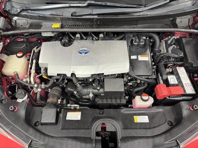 プリウス Ｓツーリングセレクション　インテリキー　地デジ　リアカメラ　ＬＥＤヘッドライト　セキュリティー　寒冷地仕様車　シートヒーター　オートエアコン　デュアルエアバッグ　ＥＳＣ　フルタイム４ＷＤ　メモリーナビゲーション　ＥＴＣ車載器（11枚目）