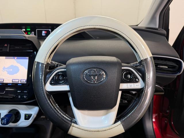 プリウス Ｓツーリングセレクション　インテリキー　地デジ　リアカメラ　ＬＥＤヘッドライト　セキュリティー　寒冷地仕様車　シートヒーター　オートエアコン　デュアルエアバッグ　ＥＳＣ　フルタイム４ＷＤ　メモリーナビゲーション　ＥＴＣ車載器（29枚目）