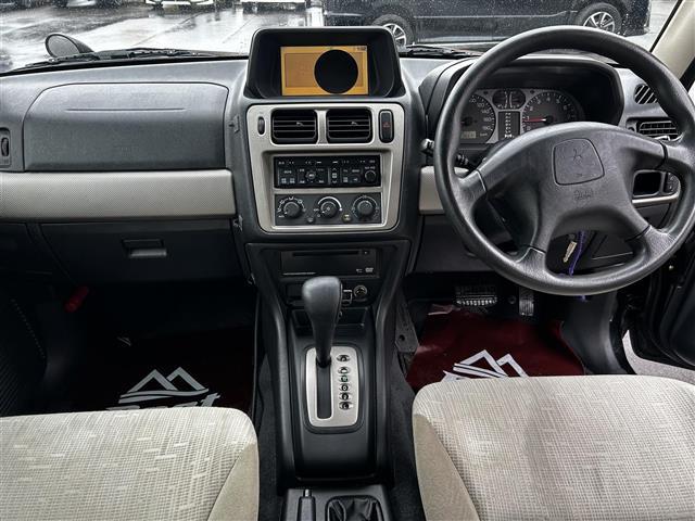 パジェロイオ パールパッケージ　ナビエディション　走行距離３６７００キロ　運転席助手席エアバック　純正アルミホイール　電動格納ドアミラー　オートエアコン　ＡＢＳ　背面タイヤ　社外ドライブレコーダー（10枚目）