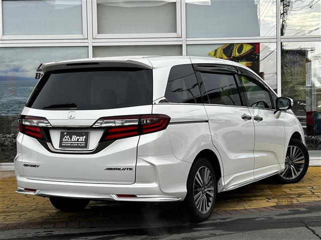 オデッセイ アブソルート・ホンダセンシング　ワンオーナー　純正９インチプレミアムインターナビ　バックカメラ　フルセグＴＶ　フリップダウンモニター　両側パワースライドドア　運転席パワーシート　純正エンジンスターター（8枚目）