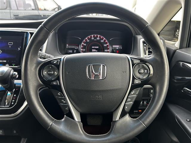 オデッセイ アブソルート・ホンダセンシング　ワンオーナー　純正９インチプレミアムインターナビ　バックカメラ　フルセグＴＶ　フリップダウンモニター　両側パワースライドドア　運転席パワーシート　純正エンジンスターター（15枚目）