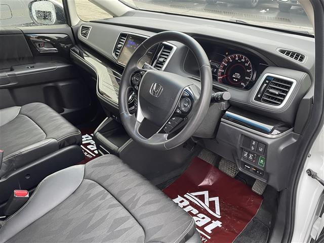 オデッセイ アブソルート・ホンダセンシング　ワンオーナー　純正９インチプレミアムインターナビ　バックカメラ　フルセグＴＶ　フリップダウンモニター　両側パワースライドドア　運転席パワーシート　純正エンジンスターター（21枚目）