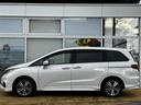 オデッセイ アブソルート・ホンダセンシング　ワンオーナー　純正９インチプレミアムインターナビ　バックカメラ　フルセグＴＶ　フリップダウンモニター　両側パワースライドドア　運転席パワーシート　純正エンジンスターター（5枚目）
