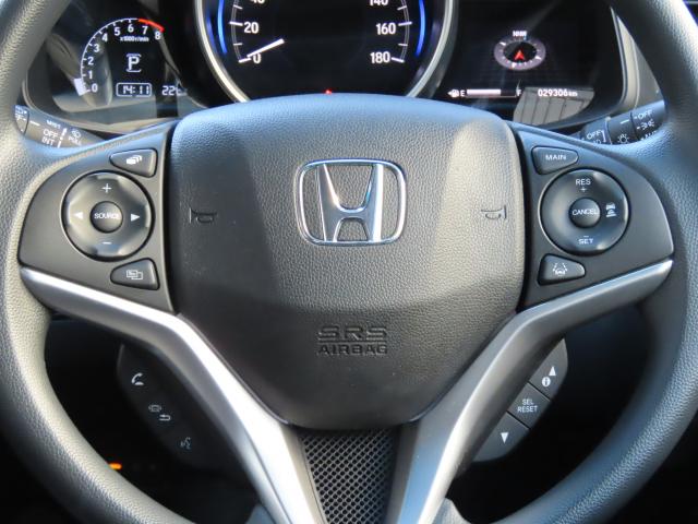 フィット 13G・Lホンダセンシング 純正ナビ エンスタ TVフル リアカメラ ETC 4WD オートクルーズコントロール DVD再生 アイドリングストップ USB入力端子 衝突防止システム LEDヘッドランプ 横滑り防止装置 エアバッグ(12枚目)