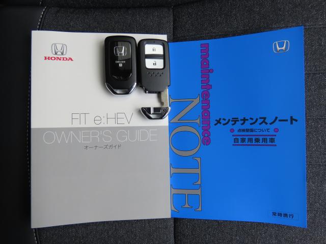 フィット ｅ：ＨＥＶホーム　当社試乗車　純正ナビ　夏冬タイヤ付　３カメラドラレコ　ＴＶフル　リアカメラ　ＥＴＣ（23枚目）