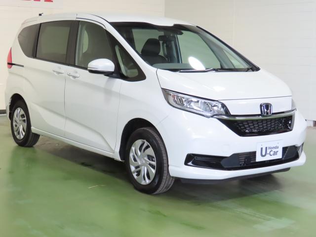 フリード+ G・ホンダセンシング 車検整備付 純正ナビ 夏冬タイヤ付 TVフル リアカメラ ETC 4WD 両側電動スライドドア シートヒーター オートクルーズコントロール DVD再生 アイドリングストップ USB入力端子 エアバッグ(5枚目)