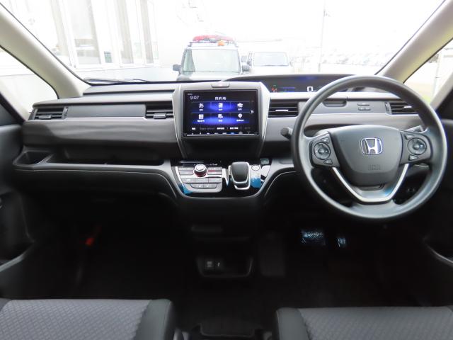 フリード+ハイブリッド ハイブリッドGブラックスタイル 当社使用レンタカー 純正9インチナビ 夏冬タイヤ付 ドラレコ TVフル リアカメラ ETC(11枚目)