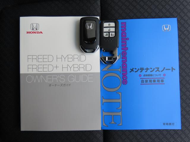 フリード+ハイブリッド ハイブリッドGブラックスタイル 当社使用レンタカー 純正9インチナビ 夏冬タイヤ付 ドラレコ TVフル リアカメラ ETC(23枚目)