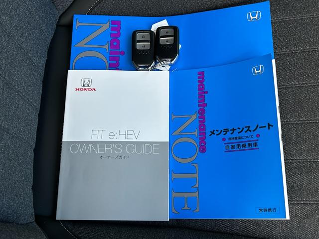 フィット e:HEVホーム 当社試乗車 純正9インチナビ 夏冬タイヤ付 ドラレコ TVフル リアカメラ ETC(23枚目)