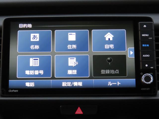 フィット e:HEVホームブラックスタイル 当社使用レンタカー 純正9インチナビ 夏冬タイヤ付 ドラレコ TVフル リアカメラ ETC(3枚目)