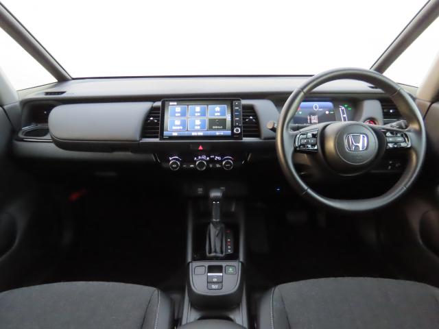 フィット e:HEVホームブラックスタイル 当社使用レンタカー 純正9インチナビ 夏冬タイヤ付 ドラレコ TVフル リアカメラ ETC(10枚目)