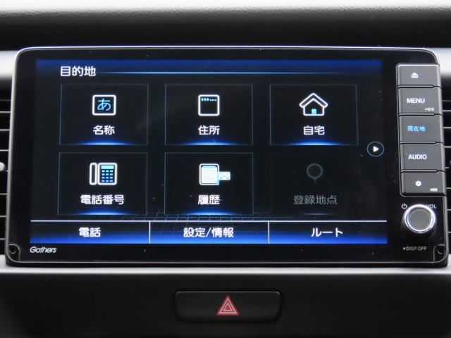 フィット e:HEVホーム 当社試乗車 純正9インチナビ 夏冬タイヤ付 ドラレコ TVフル リアカメラ ETC(4枚目)