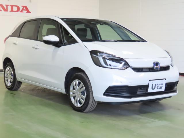 フィット e:HEVホーム 当社試乗車 純正9インチナビ 夏冬タイヤ付 ドラレコ TVフル リアカメラ ETC(7枚目)