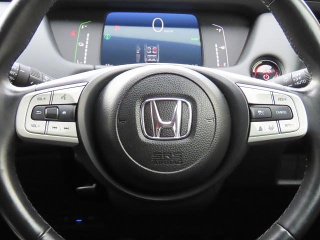 フィット e:HEVホーム 当社試乗車 純正9インチナビ 夏冬タイヤ付 ドラレコ TVフル リアカメラ ETC(13枚目)