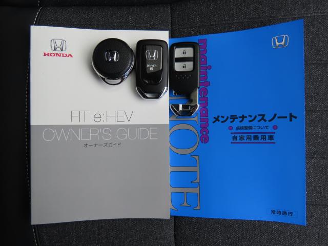フィット e:HEVホーム 当社試乗車 純正9インチナビ 夏冬タイヤ付 ドラレコ TVフル リアカメラ ETC(24枚目)