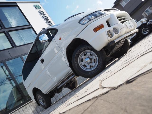 デリカスペースギア 　４ＷＤディーゼルターボ・ハイルーフ・本州車両・走行８２７００ｋｍ・フルノーマル・禁煙車・社外ナビ・Ｂカメラ・フルセグ・Ｂｌｕｅｔｏｏｔｈ・ＥＴＣ・ＤＶＤ・ＡＢＳ（3枚目）