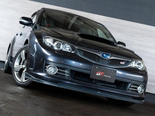 ＷＲＸ　ＳＴＩ　Ａライン　ＳＴＩフロントスポイラー　ＯＰブレンボキャリパー　純正ＯＰクラリオンナビ　地デジ　社外マフラー　ハーフレザー　パワーシート　ＳＩドライブ　パドルシフト　クルコン　ＨＩＤ　フォグＬＥＤ　スマートキー(11枚目)