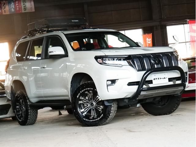 ランドクルーザープラド ＴＸ　ワンオーナー　リフトアップ　ビルシュタイン　純正ナビ　ワンセグ　ＣＤ　Ｂｌｕｅｔｏｏｔｈ　バックカメラ　サンルーフ　レーダークルーズ　ルーフラック　リアラダー　スマートキー　オートハイビーム（3枚目）