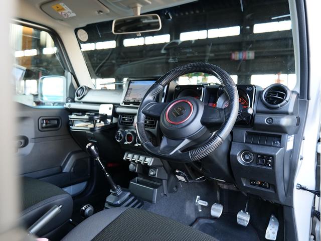 ジムニーシエラ JL 5MT リフトアップ JAOSリフトアップきっと RAYS16AW フジツボマフラー 津田レーシングエアクリ 純正8型ナビ フルセグ Bカメラ カーボン調コンビハンドル 前後ドラレコ ETC(20枚目)