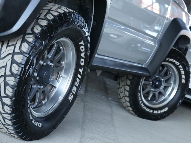 ジムニーシエラ JL 5MT リフトアップ JAOSリフトアップきっと RAYS16AW フジツボマフラー 津田レーシングエアクリ 純正8型ナビ フルセグ Bカメラ カーボン調コンビハンドル 前後ドラレコ ETC(57枚目)