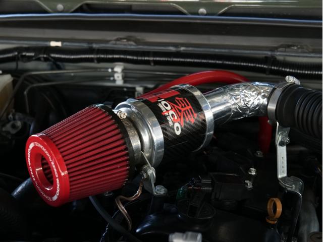 ジムニー ＸＣ　５ＭＴ　ワンオーナー　リフトアップ　ナビ／フルセグ／Ｂカメラ／ＤＶＤ／ＣＤ／Ｂｌｕｅｔｏｏｔｈ　デジタルミラー　フロントカメラ　ショートバンパー　ＲＹＡＳ１６ＡＷ　外マフラー　ゼロ１０００チャンバー（37枚目）