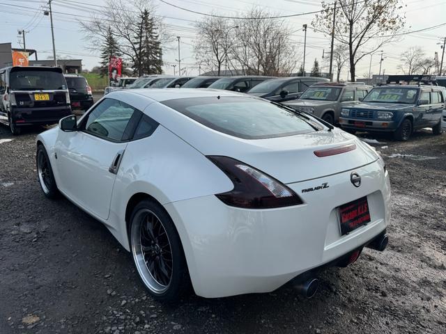 フェアレディZ バージョンT ロッソモデロ製マフラー社外19インチアルミホイール純正HDDナビバックカメラスマートキープッシュスタート運転席助手席パワーシート運転席助手席シートヒーターVDCETCステアリングスイッチ(5枚目)