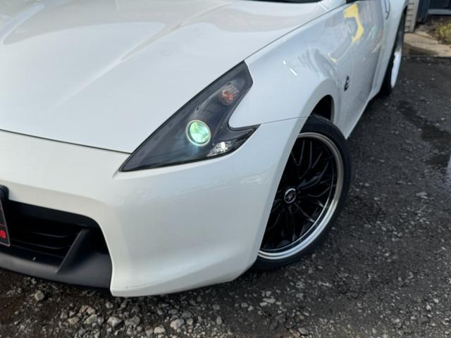 フェアレディZ バージョンT ロッソモデロ製マフラー社外19インチアルミホイール純正HDDナビバックカメラスマートキープッシュスタート運転席助手席パワーシート運転席助手席シートヒーターVDCETCステアリングスイッチ(25枚目)