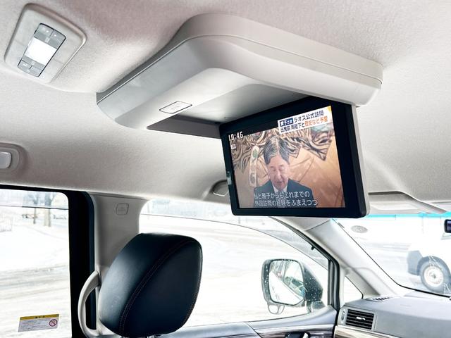 エルグランド ２５０ハイウェイスター　４ＷＤ　寒冷地仕様　純正ナビ　後席モニター　バックカメラ　両側パワースライド　２列目オットマンシート　ＬＥＤヘッドライト　スマートキー　横滑り防止　ＭＴモード　ハーフレザーシート　ＥＴＣ　純正アルミ（49枚目）