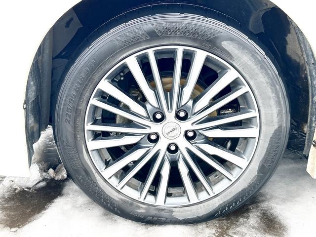 エルグランド ２５０ハイウェイスター　４ＷＤ　寒冷地仕様　純正ナビ　後席モニター　バックカメラ　両側パワースライド　２列目オットマンシート　ＬＥＤヘッドライト　スマートキー　横滑り防止　ＭＴモード　ハーフレザーシート　ＥＴＣ　純正アルミ（74枚目）