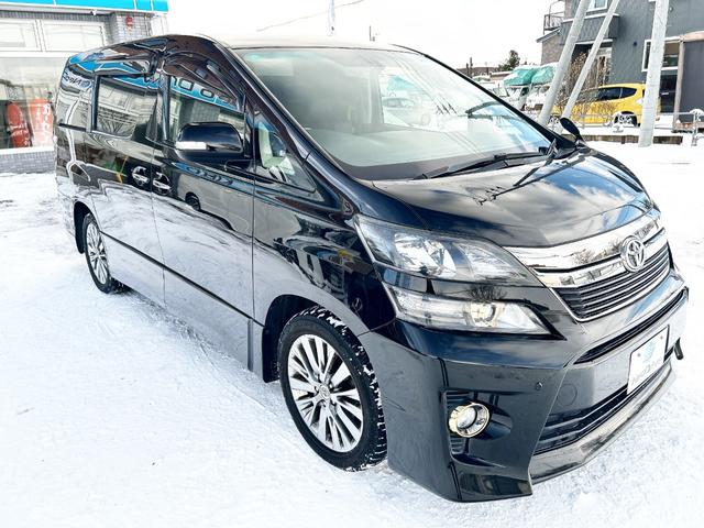 ヴェルファイア 2.4Z ゴールデンアイズ 4WD 本州仕入 純正ナビ 後席モニター 両側パワースライド 電動リアゲート ハーフレザー 2列目オットマンシート 7人乗り HID 純正アルミ 横滑り防止 MTモード付 CVT タイミングチェーン(22枚目)