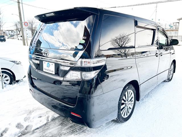 ヴェルファイア 2.4Z ゴールデンアイズ 4WD 本州仕入 純正ナビ 後席モニター 両側パワースライド 電動リアゲート ハーフレザー 2列目オットマンシート 7人乗り HID 純正アルミ 横滑り防止 MTモード付 CVT タイミングチェーン(25枚目)