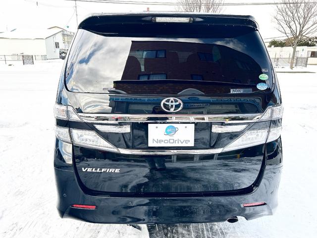 ヴェルファイア 2.4Z ゴールデンアイズ 4WD 本州仕入 純正ナビ 後席モニター 両側パワースライド 電動リアゲート ハーフレザー 2列目オットマンシート 7人乗り HID 純正アルミ 横滑り防止 MTモード付 CVT タイミングチェーン(26枚目)