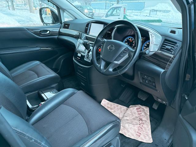 エルグランド ２５０ハイウェイスター　４ＷＤ　本州仕入　寒冷地仕様　パワースライドドア　純正ナビ　フルセグＴＶ　純正ＬＥＤ　純正アルミ　バックカメラ　オートクルーズ　　Ｂｌｕｅｔｏｏｔｈ　ハーフレザーシート　ＥＴＣ　オットマン　３列シート（7枚目）