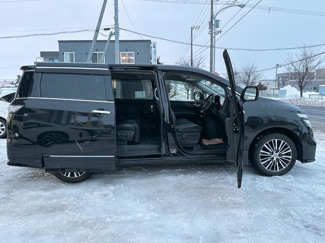 エルグランド ２５０ハイウェイスター　４ＷＤ　本州仕入　寒冷地仕様　パワースライドドア　純正ナビ　フルセグＴＶ　純正ＬＥＤ　純正アルミ　バックカメラ　オートクルーズ　　Ｂｌｕｅｔｏｏｔｈ　ハーフレザーシート　ＥＴＣ　オットマン　３列シート（22枚目）