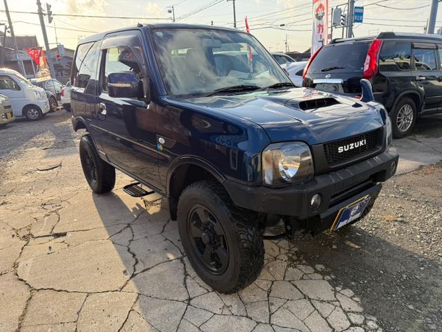 ジムニー ランドベンチャー　４ＷＤ　リフトアップ車　社外バンパー　社外ステップ　キーレスエントリー　電動格納ミラー　ドライブシートヒター　社外グリル　スキットプレート（4枚目）