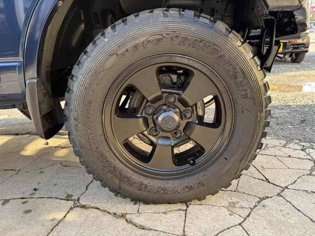 ジムニー ランドベンチャー　４ＷＤ　リフトアップ車　社外バンパー　社外ステップ　キーレスエントリー　電動格納ミラー　ドライブシートヒター　社外グリル　スキットプレート（15枚目）