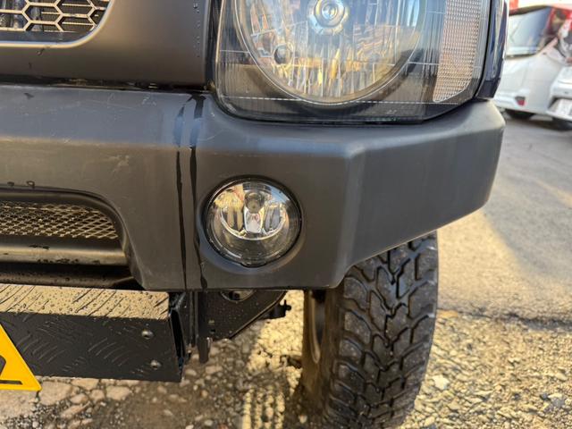 ジムニー ランドベンチャー　４ＷＤ　リフトアップ車　社外バンパー　社外ステップ　キーレスエントリー　電動格納ミラー　ドライブシートヒター　社外グリル　スキットプレート（18枚目）