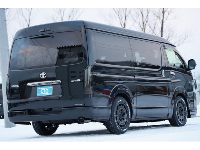 ハイエースバン スーパーＧＬ　ダークプライムＩＩ　登録済未使用車　新車コンプリート　寒冷地仕様　パノラミックビュー　デジタルインナーミラー　両側パワスラ　パワーバックドア　運助イージークローズ　アルパインＢＩＧＸ　レガンスエアロ　玄武ローダウン（58枚目）