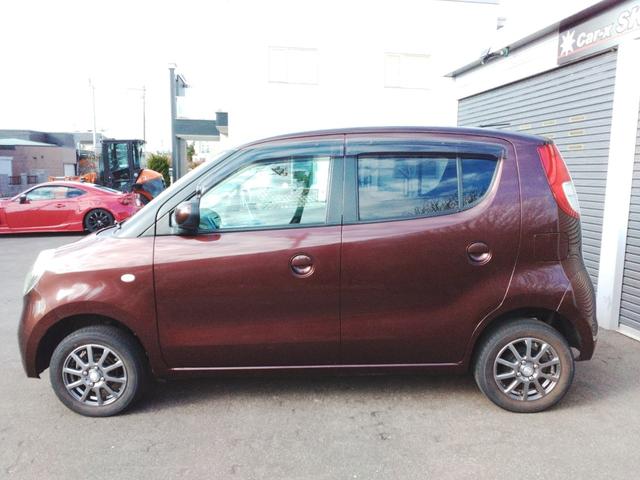 モコ Ｅ　ＦＯＵＲ　ショコラティエ　寒冷地仕様　スマートキー　シートヒーター　エンジンスターター　純正ＣＤコンポ　ベンチシート　アルミホイール（8枚目）