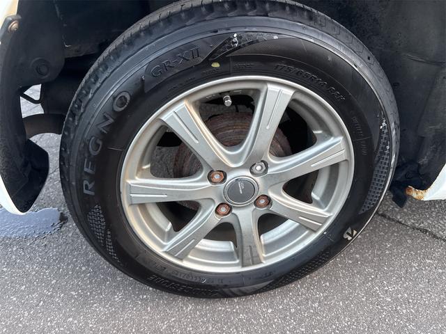 フィット １３Ｇ・スマートセレクション　ファインスタイル　ナビ　アルミホイール　ＨＩＤ　スマートキー　電動格納ミラー　ＣＶＴ　盗難防止システム　衝突安全ボディ　ＡＢＳ　エアコン　パワーステアリング（49枚目）