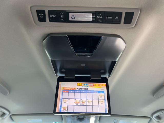 ヴェルファイア ２．４Ｚ　プラチナセレクションＩＩ　４ＷＤ　アルパインＨＤＤナビ　ＣＤ　ＤＶＤ　フルセグＴＶ　バックカメラ　両側パワースライドドア　パワーバックドア　フリップダウンモニター　寒冷地仕様　横滑り防止　ＨＩＤ　フォグライト　オットマン（12枚目）