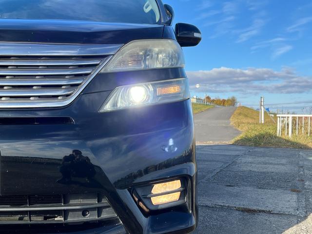 ヴェルファイア ２．４Ｚ　プラチナセレクションＩＩ　４ＷＤ　アルパインＨＤＤナビ　ＣＤ　ＤＶＤ　フルセグＴＶ　バックカメラ　両側パワースライドドア　パワーバックドア　フリップダウンモニター　寒冷地仕様　横滑り防止　ＨＩＤ　フォグライト　オットマン（26枚目）