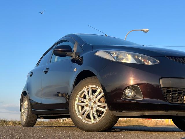 デミオ １３Ｃ　社外ナビ　ＣＤ　Ｂｌｕｅｔｏｏｔｈ　ワンセグＴＶ　キーレスキー　レベライザー　フォグ（21枚目）