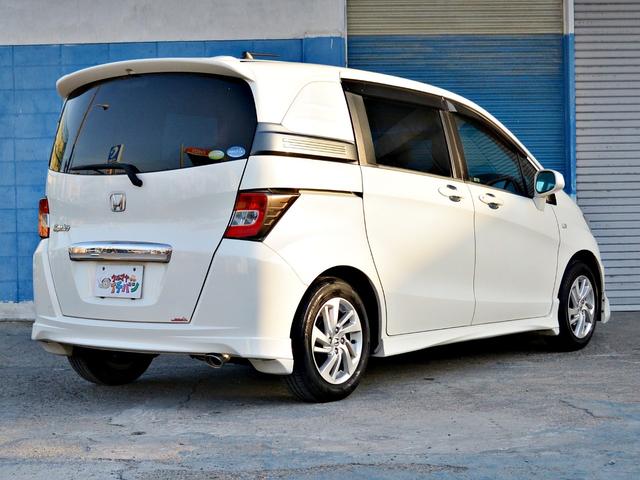 フリードスパイク Ｇ　エアロ　メモリナビ　Ｗエアバッグ　ナビ＆ＴＶ　キーレスキー　ＡＡＣ　運転席エアバック　パワーウィンドウ　パワーステアリング　ＡＢＳ　ＥＴＣ　両側スライドドア　アルミホイール　ワンセグテレビ　メモリ－ナビ（12枚目）