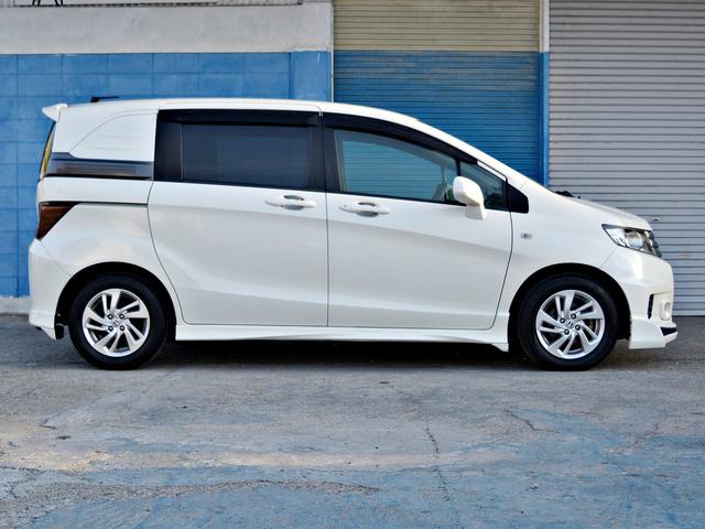 フリードスパイク Ｇ　エアロ　メモリナビ　Ｗエアバッグ　ナビ＆ＴＶ　キーレスキー　ＡＡＣ　運転席エアバック　パワーウィンドウ　パワーステアリング　ＡＢＳ　ＥＴＣ　両側スライドドア　アルミホイール　ワンセグテレビ　メモリ－ナビ（14枚目）