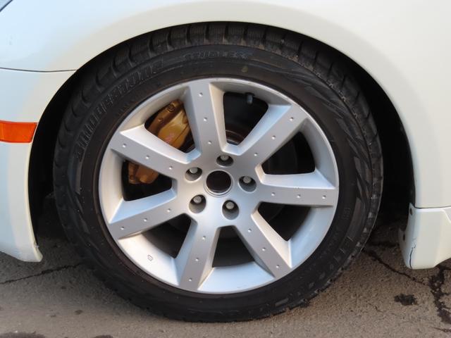 スカイライン ３５０ＧＴ　アルミホイール　ＨＩＤ　ＭＴ　キーレスエントリー　盗難防止システム　パワーシート　ＣＤ　カセット　衝突安全ボディ　ＡＢＳ　ＥＳＣ　エアコン　パワーステアリング　パワーウィンドウ　運転席エアバッグ（19枚目）