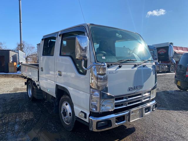 エルフトラック Ｗキャブフルフラットロー　４ＷＤ　６人定員　５ＭＴ　２１００ボデー　荷台鉄板　積載１．５トン　総重量４．３トン（3枚目）