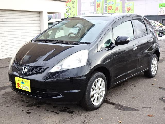 フィット Ｇスマートセレクション　事故無し　４ＷＤ　社外ＣＤ　社外エンジンスターター　スマートキー　ＥＴＣ　ウインカーミラー　１５インチアルミホイール　デアイサー（8枚目）