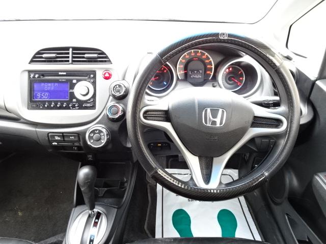 フィット Ｇスマートセレクション　事故無し　４ＷＤ　社外ＣＤ　社外エンジンスターター　スマートキー　ＥＴＣ　ウインカーミラー　１５インチアルミホイール　デアイサー（24枚目）