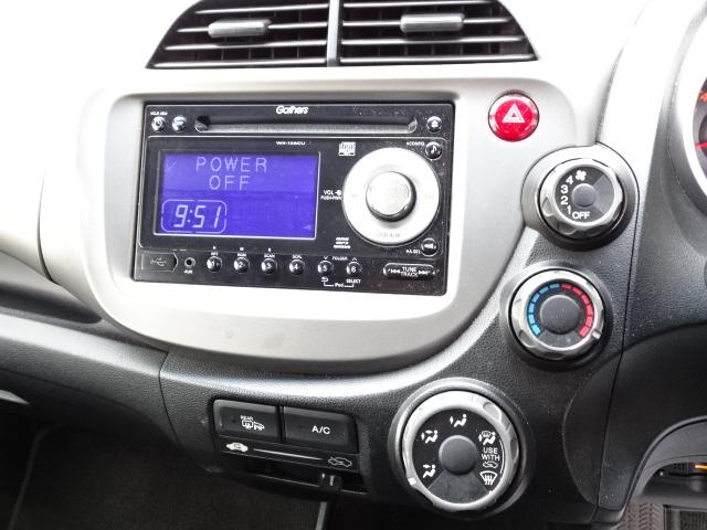 フィット Ｇスマートセレクション　事故無し　４ＷＤ　社外ＣＤ　社外エンジンスターター　スマートキー　ＥＴＣ　ウインカーミラー　１５インチアルミホイール　デアイサー（26枚目）